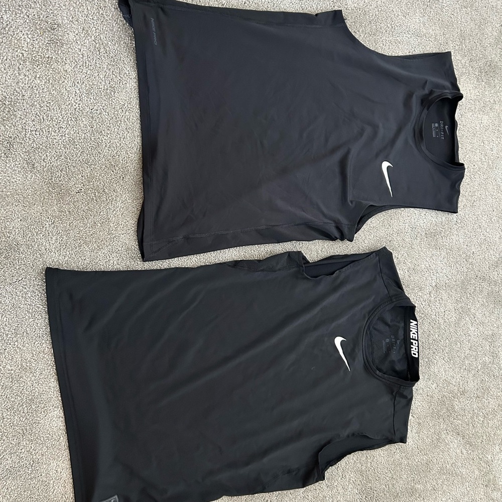 Two Nike Black Sleeveless Tops with Logo